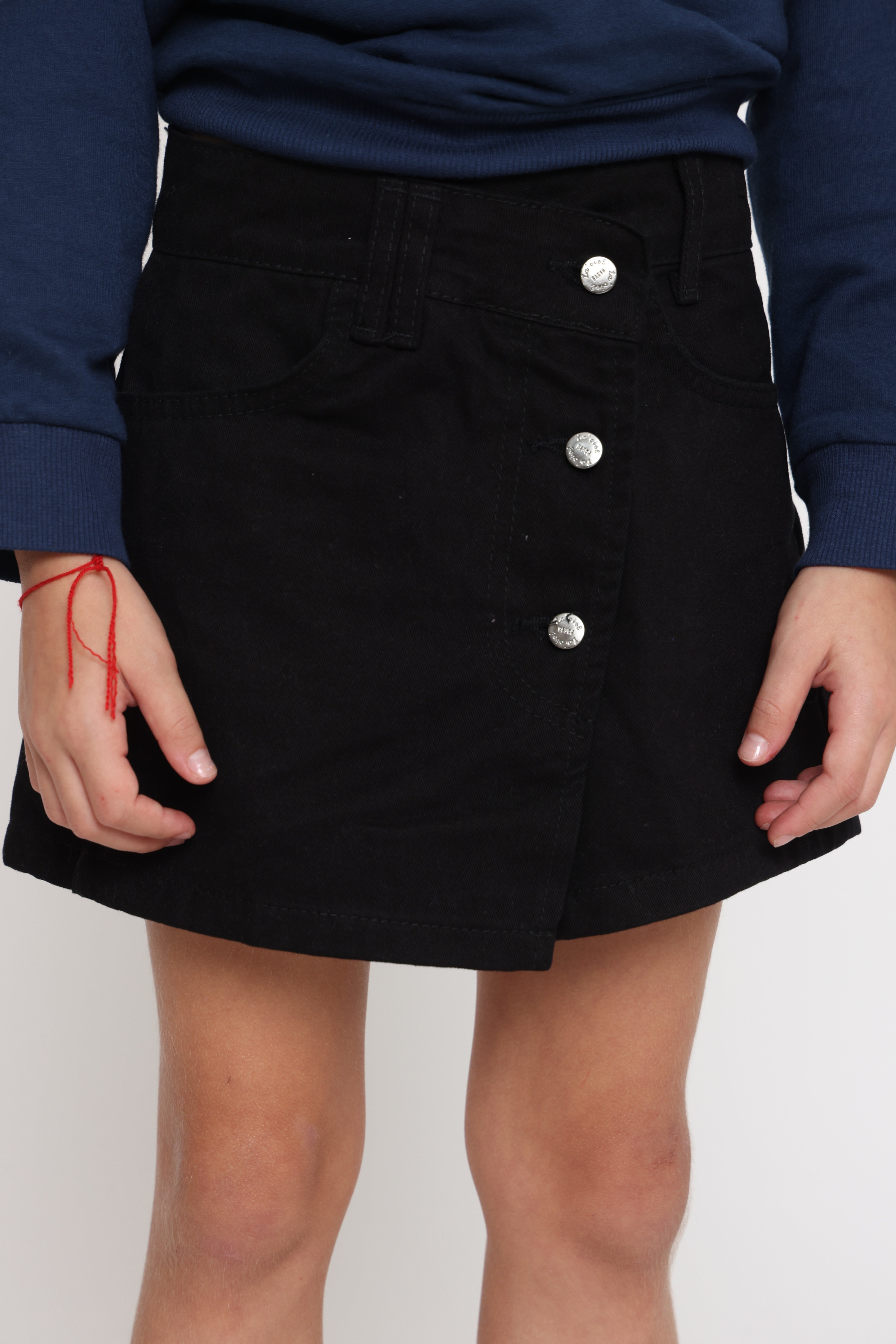 מכנס חצאית בצבע שחור לילדה